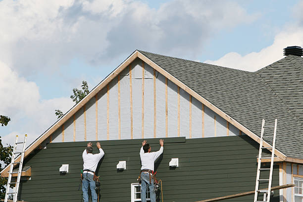 Professional Emergency Siding Repair technician working in Revere, MA